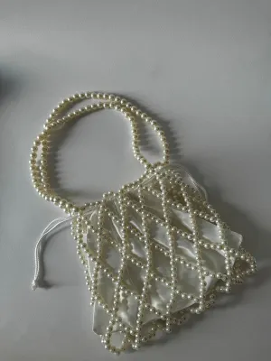 The White Pearl Bag